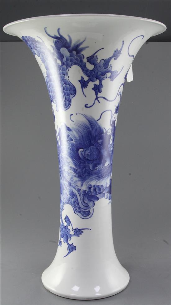 A large Japanese blue and white trumpet shaped vase, by Makuzu Kozan II (Miyagawa Hanzan, 1858-1940), 59.5cm, two hairline rim cracks